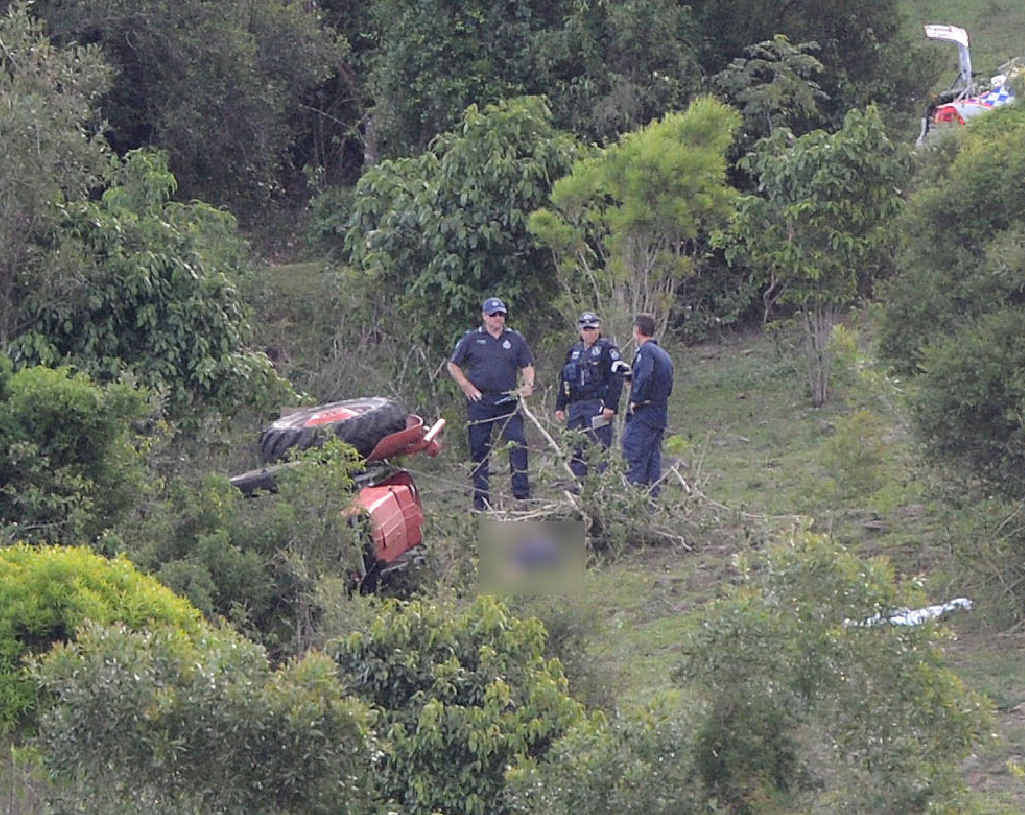 TRAGEDY: Emergency services at the Lowood property where a 65-year-old man was killed in a tractor accident. TRAGEDY: Emergency services at the Lowood property where a 65-year-old man was killed in a tractor accident.